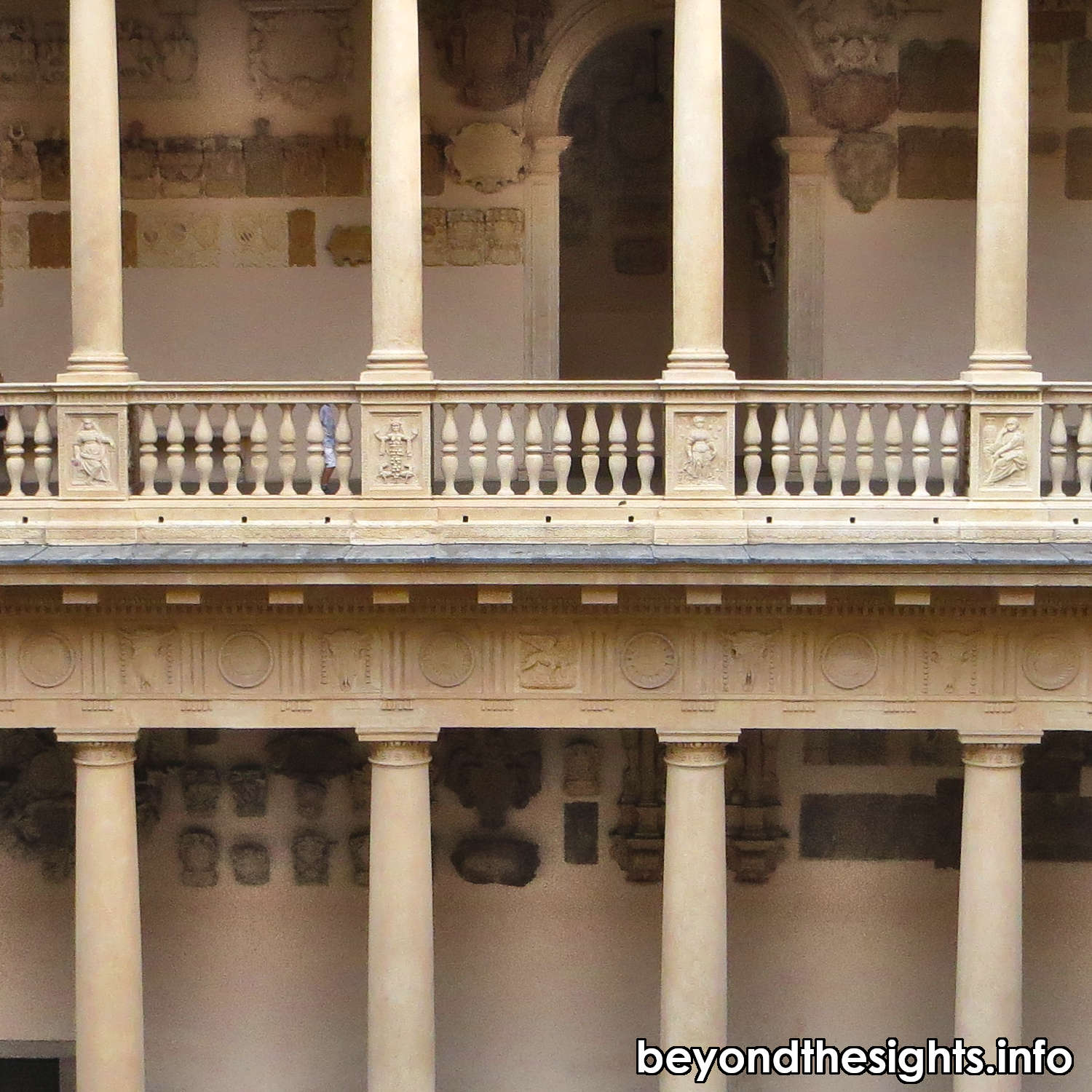 Courtyard of Palazzo Bo (University of Padova) with coat of arms on walls.